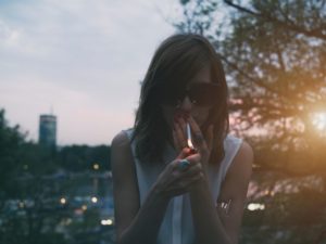 girl smoking in the street