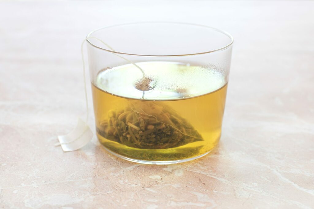 cannabis tea in glass cup